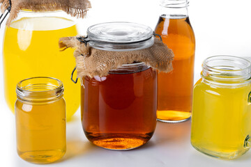 Colorful Kombucha Jars and Bottles isolated on white background