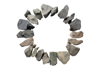 Circular frame of various sized stones.  Close-up.  Natural, rough edges.  Different shades of gray and brown