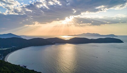 Fototapeta premium Golden Hour Over the Bay Aerial View of Tranquil Seascape at Sunset