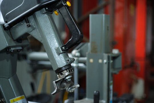 Close-up of tire changer machine