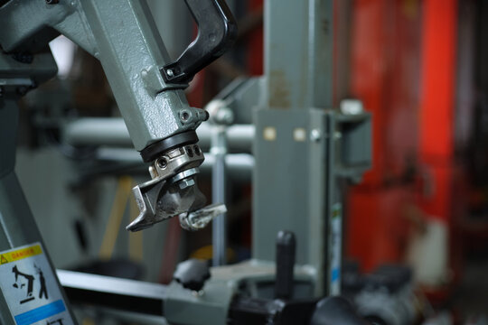 Close-up of tire changer machine