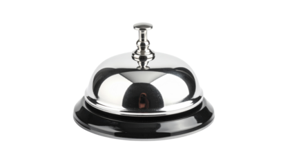 Classic shiny silver hotel reception bell on counter, isolated on transparent background, hospitality service concept