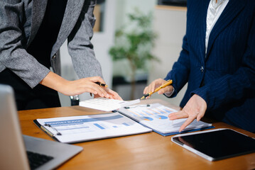 Business team collaboration discussing working analyzing with financial data and marketing growth...