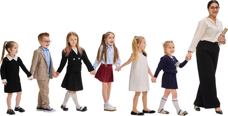 Group of children with female teacher holding hands walking together on transparent background....
