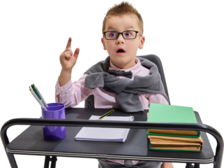 Schoolboy with glasses raising hand at desk in classroom on transparent background. Concept of education, curiosity, learning, knowledge, intelligence, participation, and academic growth.