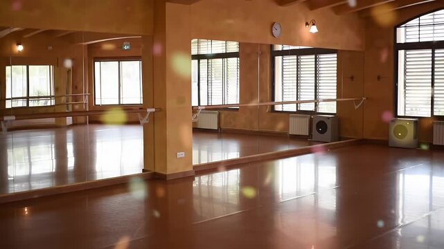 Warm Orange Walls in a Dance Studio With Windows and Mirrors Brown Floors Ballet Barres and Columns Enhancing Natural Light Ideal for Artistic Expression and Training Spaces