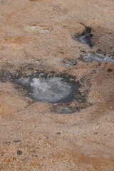 A salt formation on rocky ground near the water in Bimma