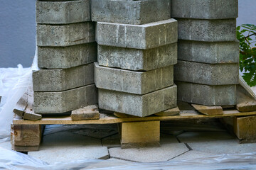 Construction.Stacked paving slabs ready to be laid on the road