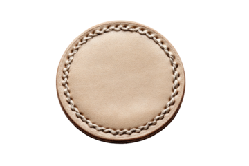 Round light beige leather coaster, stitched with light gray thread