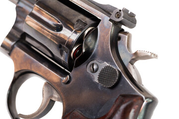 Closeup view of loaded revolver with cocked hammer