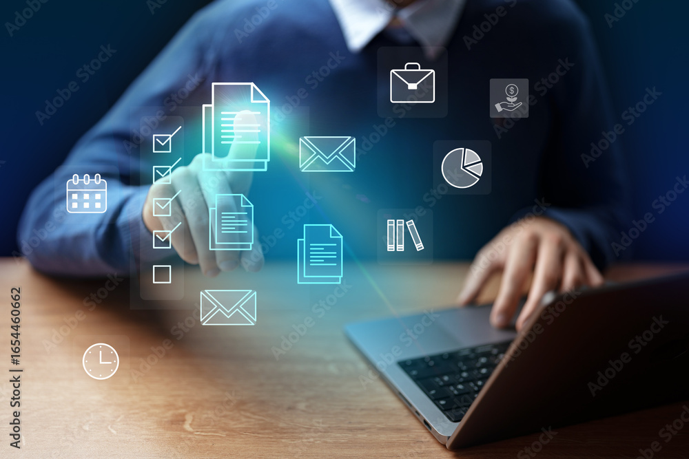 Poster digital workspace with a person interacting with virtual icons and using a laptop in a modern settin
