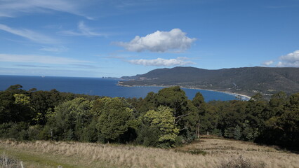 Serene Coastal Landscape Surrounded by Blue Sea and Forest, Tasmania
