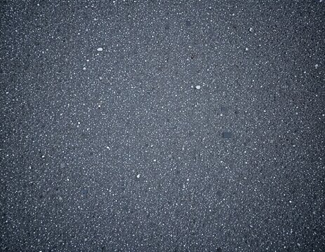 Close-up texture shot of asphalt surface, showcasing fine details and subtle variations in color. It could be used for construction, road surface or background texture - Powered by Adobe