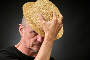 Portrait of a senior man in a vintage Harcourt style lighting