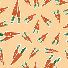 pattern of carrots of different sizes on an orange background