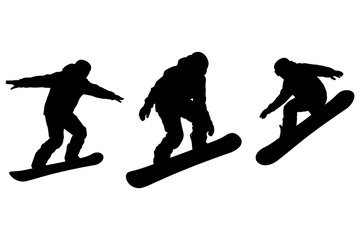 Fototapeta premium snowboarders silhouette carving down snow-covered slope 