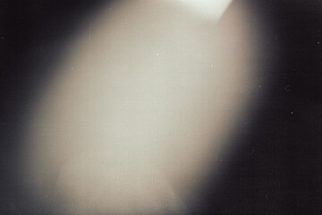 light leak overlay effect with scratch dust and bokeh light leaks,retro grain noisy film distressed texture light leak flare on black background,retro film texture overlay