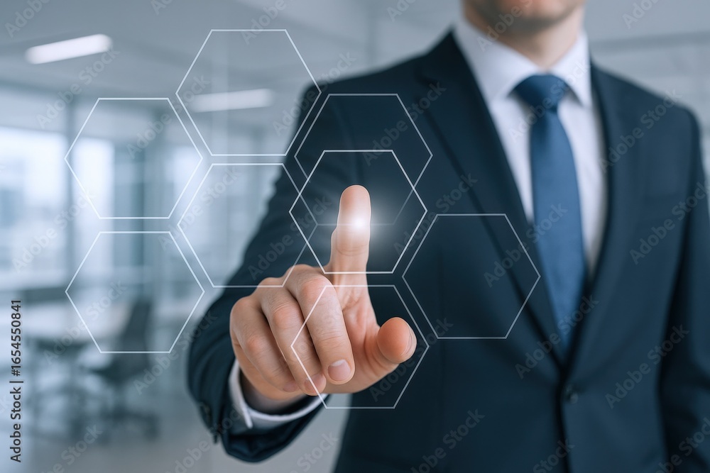 Poster businessman interacting with a futuristic digital interface displaying hexagonal grid in a modern of