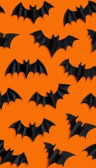 Fototapeta premium Halloween Bat Pattern on Orange Background