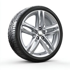 Obraz premium A close-up image of a tire and rim, with a focus on its design and features. The tire's tread patterns and rim's details are prominently visible
