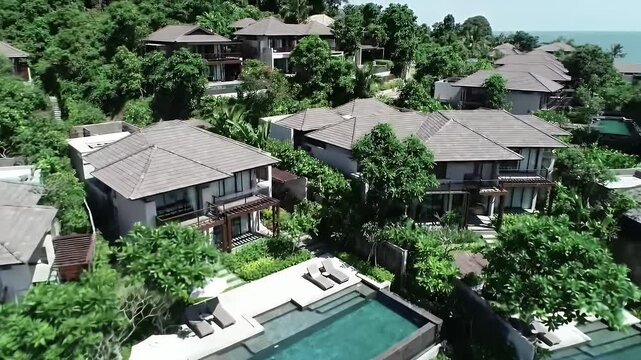 Luxury hillside villas with private pools and ocean views.