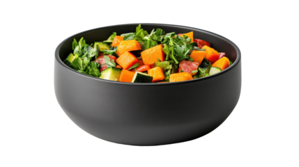 Fresh salad in a black bowl, a colorful and healthy meal option.