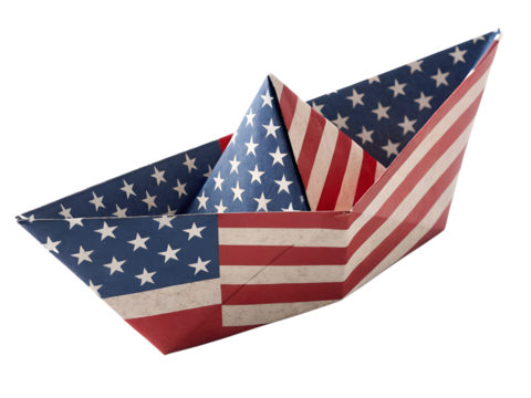 Paper boat made out of USA flag Stars and Stripes isolated on white background. Concept image.