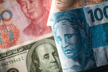 real, dollar and yuan cedula, crisis and economic tension between china, brazil and the usa