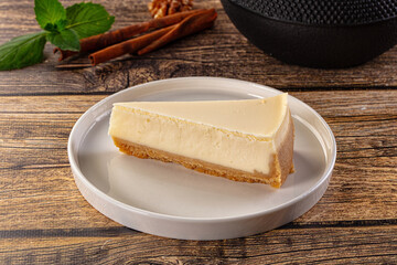 Classic delicous cheesecake slice served mint