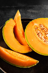 Melon Charente ripe sweet fruit tasty snack fresh delicious gourmet food background on the table rustic food top view copy space keto and paleo diet vegan and vegetarian food