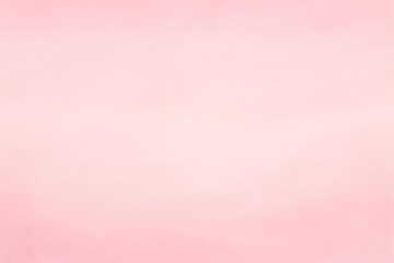 Soft pink background evoking cherry blossoms
