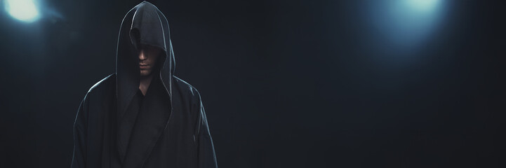 Mystic Hooded Figure in Dark Atmosphere Wide Banner