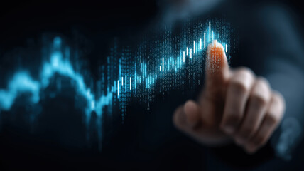 Businessman touching blue futuristic holographic charts showing growth and decline