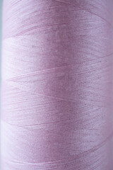 Coil of pink color with white background