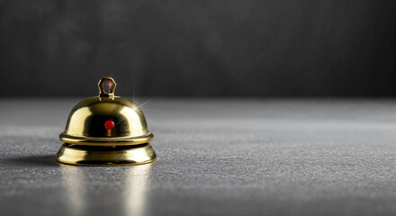 Golden Service Bell on Dark Background