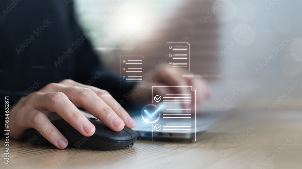 Poster hand using a mouse and a laptop with virtual documents and check marks. concept of digital document 