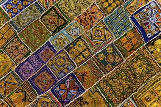 Colourful traditional wall hanging from Rajasthan, inlaid with small mirrors, Rajasthan, India