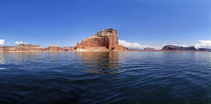 Patre Butte, rock formations, red Navajo Sandstone cliffs rising from Lake Powell, Page, Arizona, USA