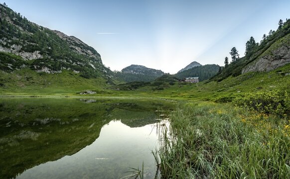 K&auml;rlingerhaus reflected in lake Funtensee, Steinernes Meer, Berchtesgaden National Park, Bavaria, Germany