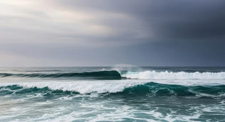 Store enrouleur Vagues de l'océan Serene Ocean Waves Under Dark Clouds with Calm Shoreline and Gentle Swells in a Landscape of Tranquility and Natural Beauty  © SebuahKisah