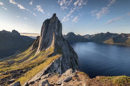 Steep mountain Segla, fjord Mefjorden with mountains, island Senja, Troms, Norway