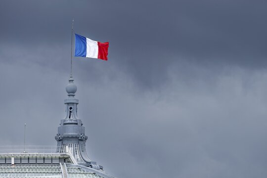 The French national flag, tricolour, on the Grand Palais, Paris, &Icirc;le-de-France, France