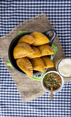 Handmade Colombian empanadas – Image of traditional Valluna empanadas with homemade filling,...