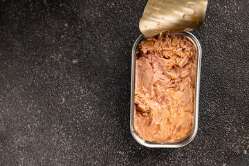 Tuna canned fish seafood tasty snack fresh delicious gourmet food background on the table rustic food top view copy space pescetarian diet
