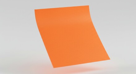 Vibrant Orange Paper Sheet Floating Against a Soft White Background