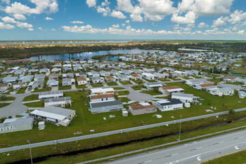 Aerial view of badly damaged mobile homes after hurricane Ian swept through residential area in...