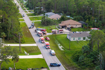 Emergency service personnel responding to potential fire hazard at Florida home. First responders...