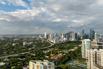 Fototapeta premium Miami, Florida, USA. Aerial view of American downtown office district. High commercial and residential skyscraper buildings in modern US city
