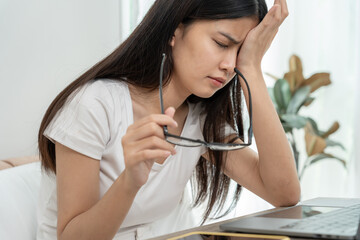 Eye problems, Asian women with tired and irritated eyes, eye rubbing, dry, eye pain after work,...