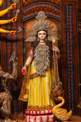 Obraz premium Subho mahalaya, An handmade idol of Goddess Durga decorated in colorful Pandal. Durga Puja is biggest religious festival of Hinduism and for bengalis and is now celebrated worldwide.